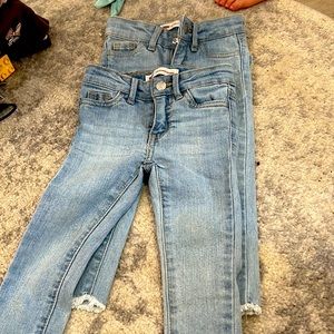 two pairs of toddler 2T Llevi’s  710 super skinny jeans